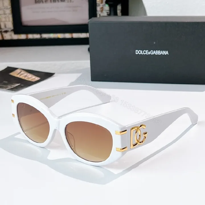View 1 of Bold White Frame Sunglasses with Gold Hardware – Luxe Gradient Lenses