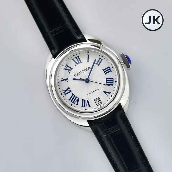 View 1 of Cartier CLE DE Cartier Key 2022 Women’s Watch – Silver Case, Black Leather Strap, Blue Roman Numerals