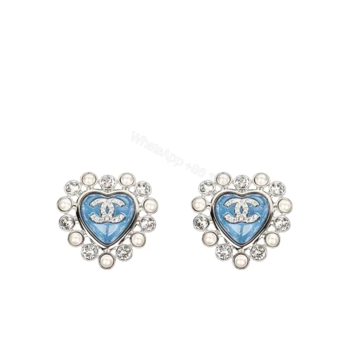 View 1 of CHANEL HEART MOTIF AND CRYSTAL EARRINGS IN BLUE
