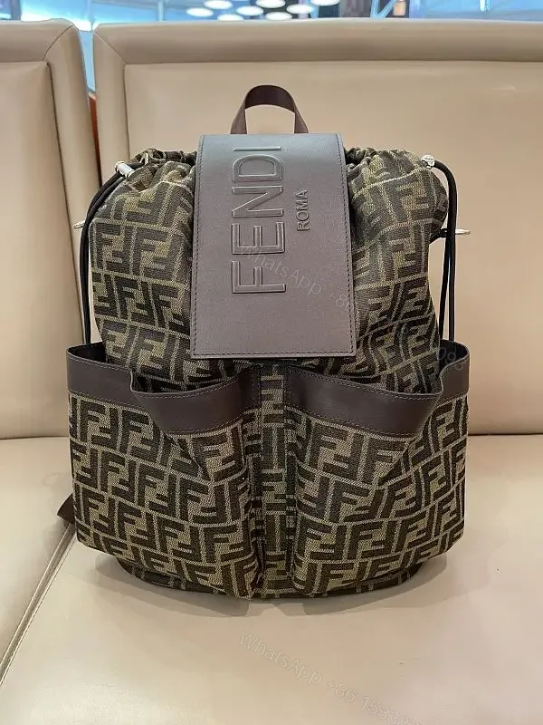 View 1 of Brown/Olive Modern Backpack with Fendi Monogram, Leather Accents, Gray Flap