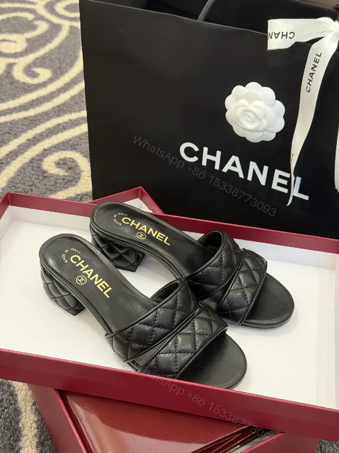 View 1 of Quilted Leather Mules – Black, Open-Toe, Low Block Heel