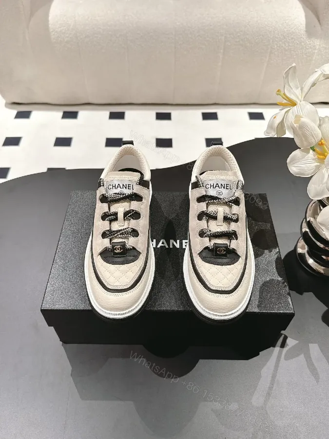 View 1 of Chic Quilted Leather Sneaker: Luxe Contrast, All-Day Comfort