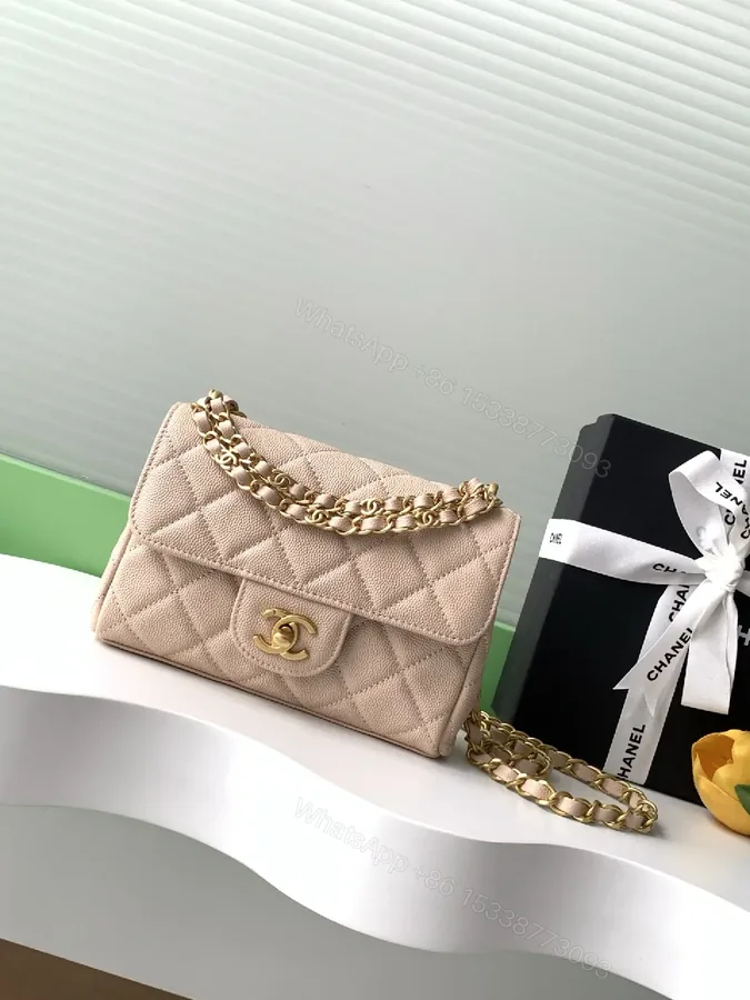 View 1 of Soft Pink Quilted Flap Bag with Gold Chain - Compact Luxury
