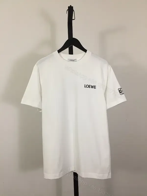 View 1 of Minimalist White Tee with Signature Accents—Premium Cotton-jersey Tee