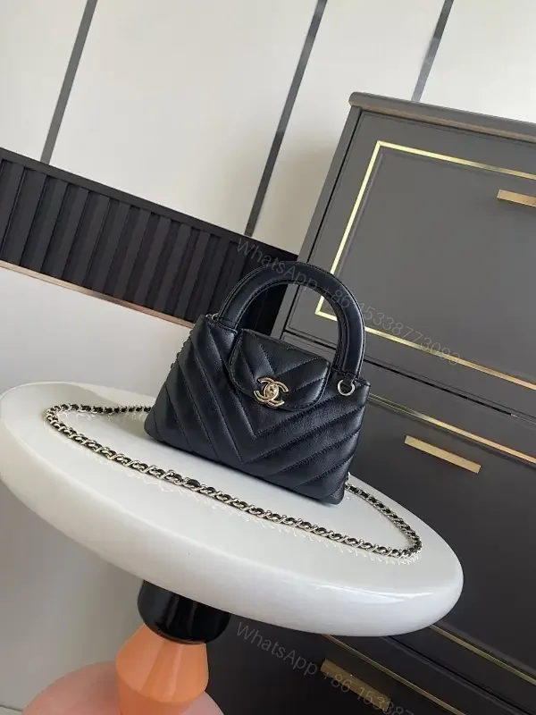 View 1 of Quilted Mini Bag: Gold-Tone Closure, Crossbody Ready
