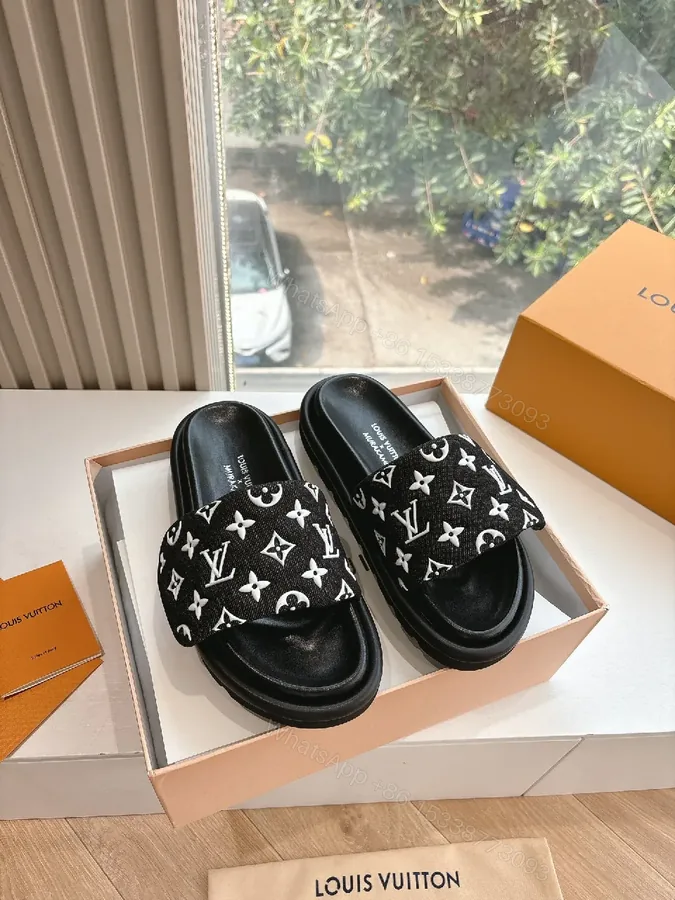 View 1 of Black Monogram Slide with LV Motif — Luxury Comfort Sandal