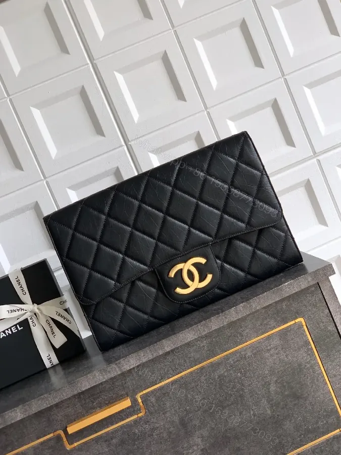 View 1 of Compact Quilted Leather Wallet with Gold Logo