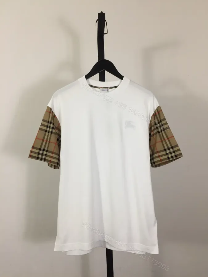View 1 of White Tee with Burberry-Check Sleeves: Minimalist Luxury Top