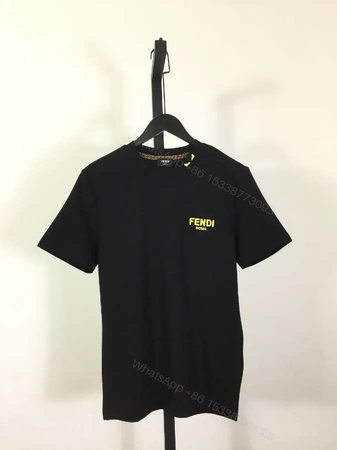 View 1 of Black Cotton T-Shirt + Minimalist Logo + Modern Crew Neck + Subtle Luxe Detail + T-Shirt