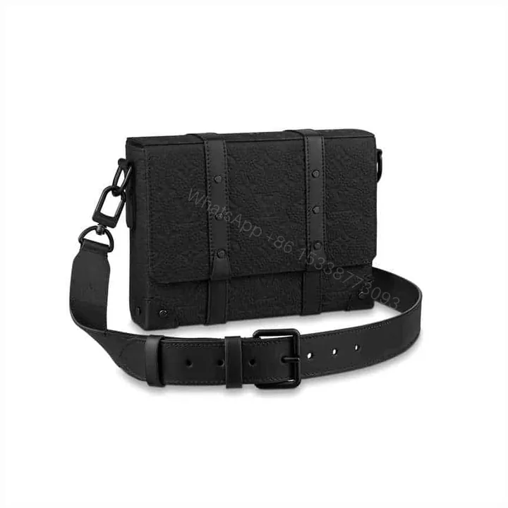 View 1 of LOUIS VUITTON TRUNK MESSENGER BAG TAURILLON MONOGRAM LEATHER M57726