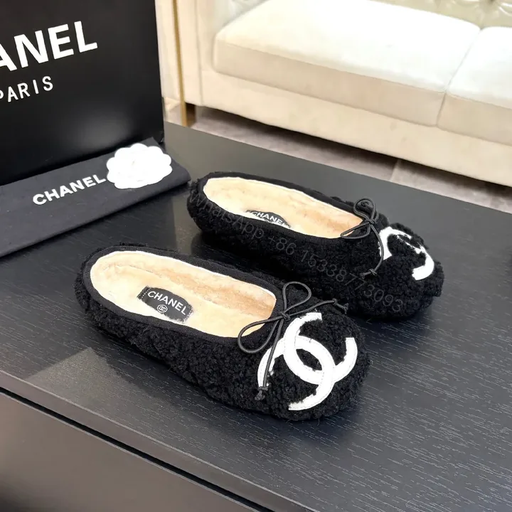 View 1 of Black Shearling Slippers with Logo Accent, Luxe Knit Sole