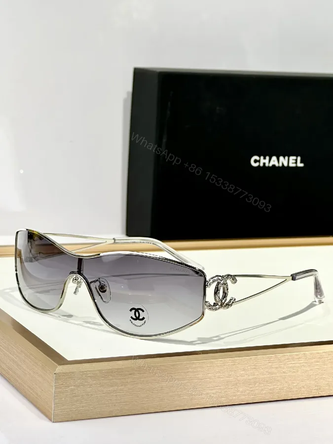 View 1 of Elegant Shield Sunglasses: Crystal-Detail Luxe Shield Glasses