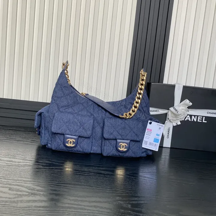 View 1 of Chic Denim Quilted Satchel with Gold Chain Strap