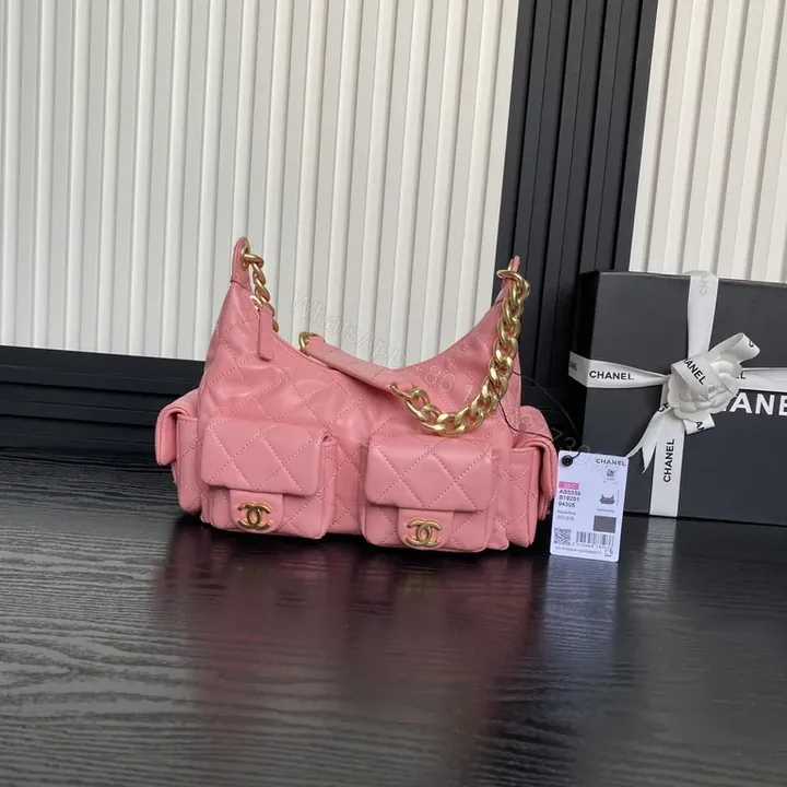 View 1 of Pink Quilted Leather Shoulder Bag with Gold Chain - Chic Luxury