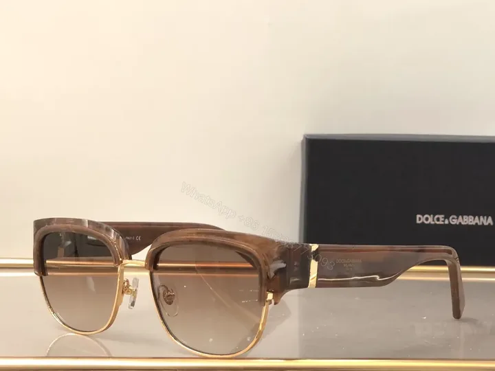 View 1 of Bold Tortoise Acetate Sunglasses with Gold Accents (Dolce & Gabbana)