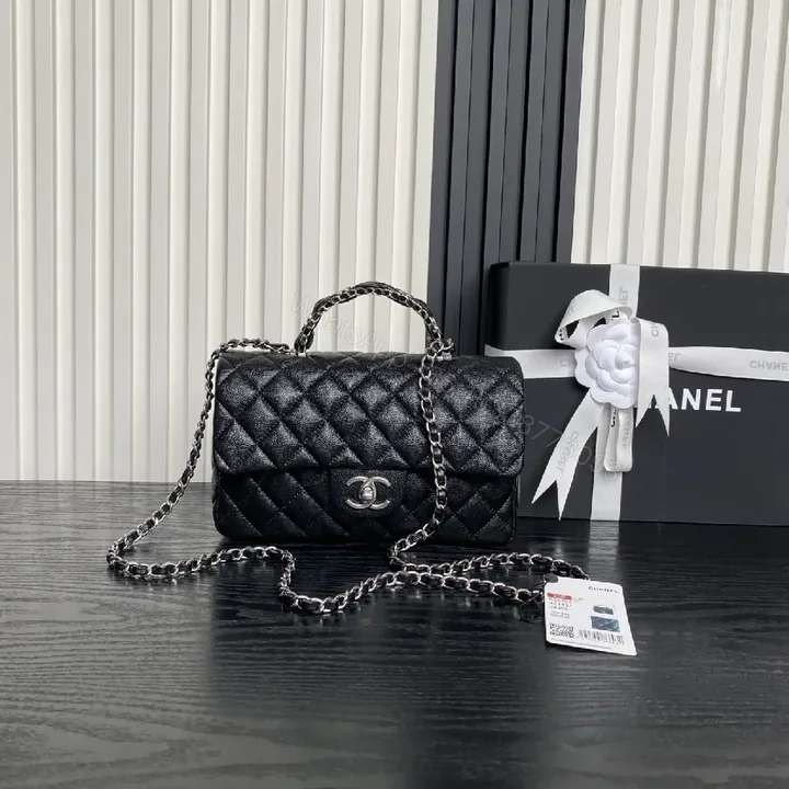 View 1 of Compact Quilted Black Flap Bag with Chain Strap