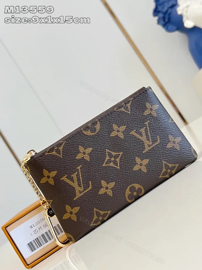 View 1 of Compact Monogram Wallet: Luxe Canvas, Gold Zip, Everyday Elegance