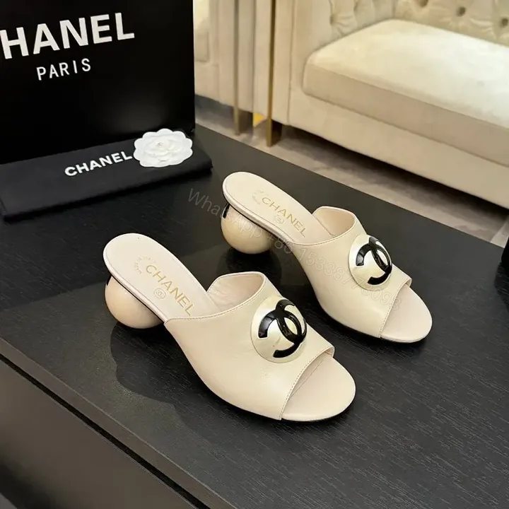 View 1 of Ivory Leather Block-Heel Slides with Interlocking Hardware