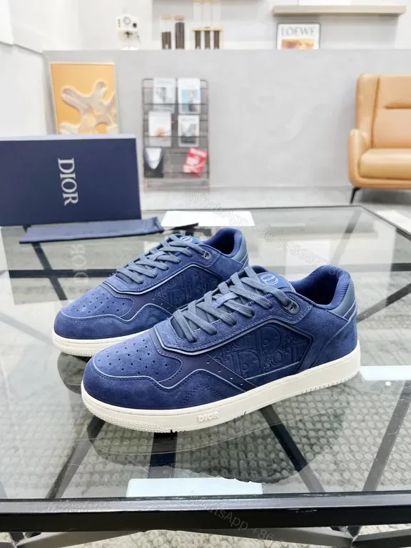 View 1 of Soft-Blend Navy Suede Sneakers with Monogram Detailing, Luxury Style
