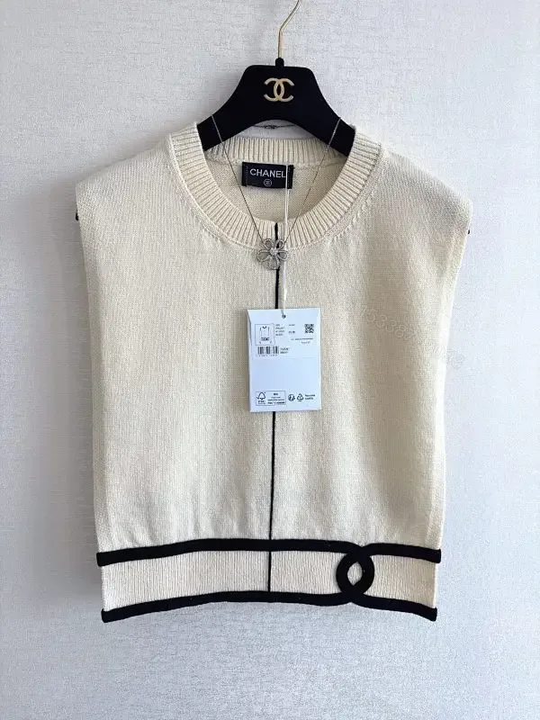 View 1 of Cream Knit Vest with Signature Trim - All-Season Comfort