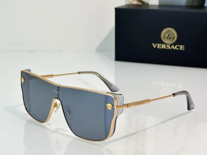 View 1 of Bold Shield Sunglasses: Gold-Accent Modern Luxe Shades