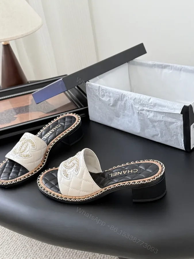 View 1 of Elegant Quilted Slide Sandals with Chain Trim
