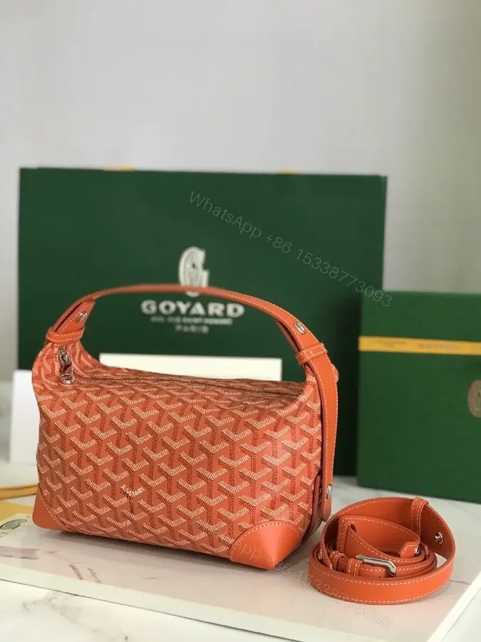 View 1 of Coral Crossbody: Monogram Textile, Leather Trim, Compact Style, Secure Zipper Bag