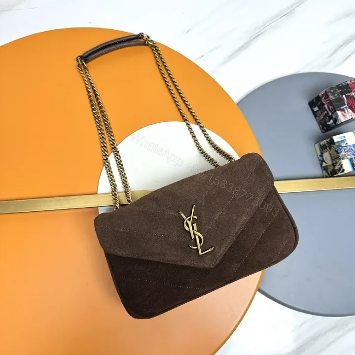 View 1 of Compact Suede Shoulder Bag with Gold Emblem - Textured Chic Everyday Luxury