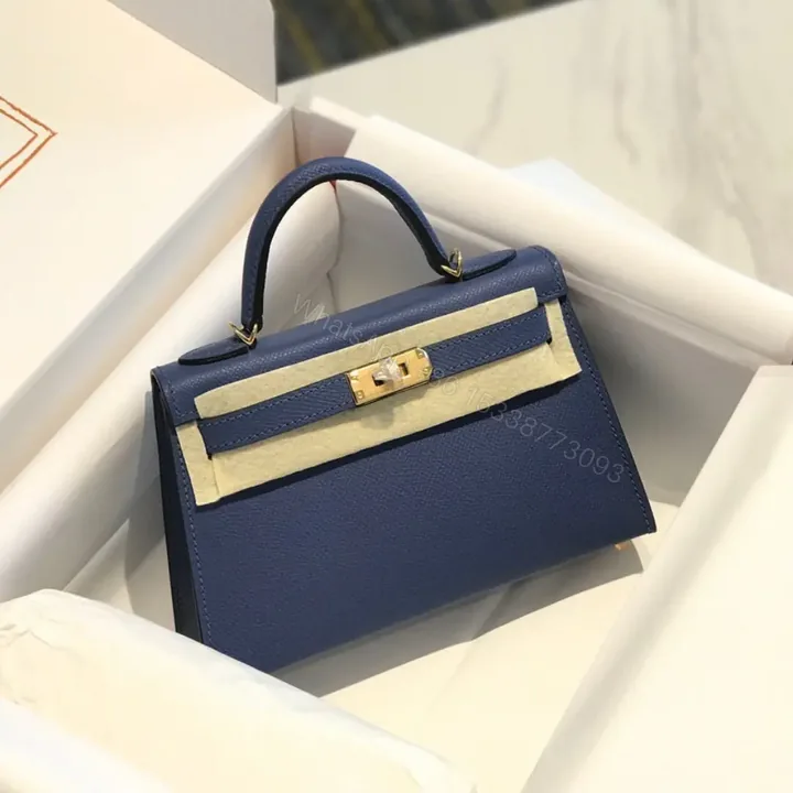 View 1 of HN Mini Kelly Blue with gold-tone hardware