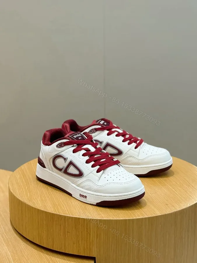 View 1 of White Leather Burgundy Accented Low-Top Sneakers: Modern Luxury Style