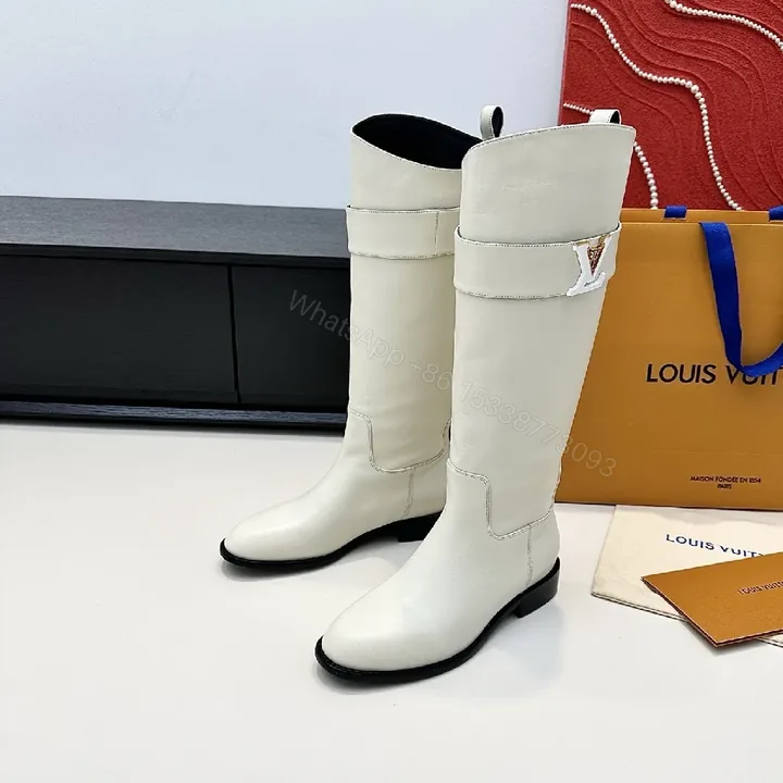 View 1 of Off-White Leather Boots: Minimalist Western Chic Comfort