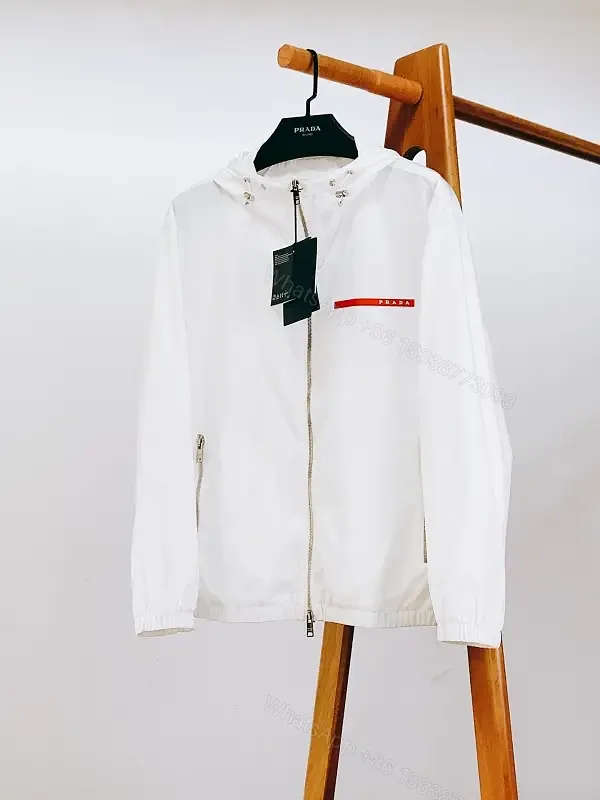 View 1 of White Nylon Windbreaker with Red Accent — Lightweight, Weather-Ready Outerwear