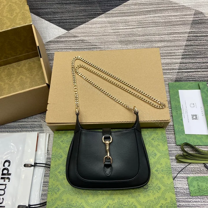 View 1 of JACKIE NOTTE MINI BAG 19 IN BLACK CALFSKIN GOLD HARDWARE