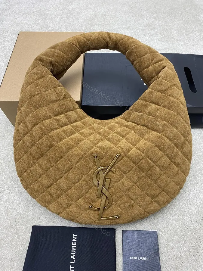 View 1 of Taupe Quilted Circle Bag - Luxury Style, Plush Top-Handle, Iconic Hardware