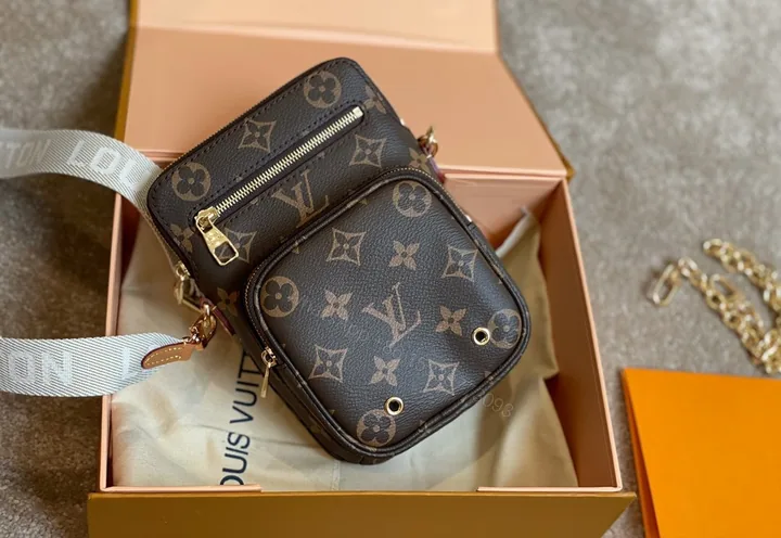 View 1 of LOUIS VUITTON Monogram Utility Phone Sleeve