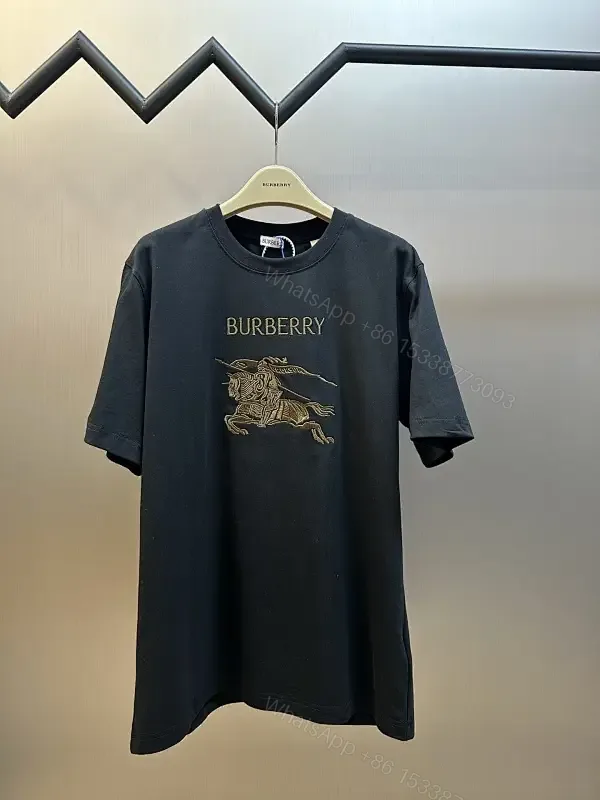 View 1 of Oversized Black Tee with Crest – Premium Cotton, Luxe Casual Tee
