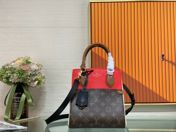 View 1 of LV Fold Tote PM
