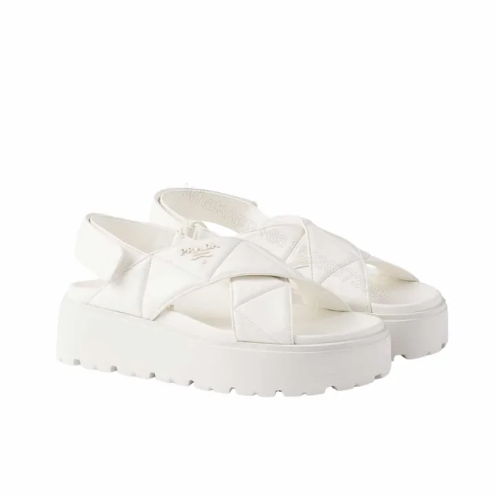 View 1 of PRADA NAPPA LEATHER CRISSCROSS FLATFORM SANDALS IVORY 1XZ777 038 F0304 F 045