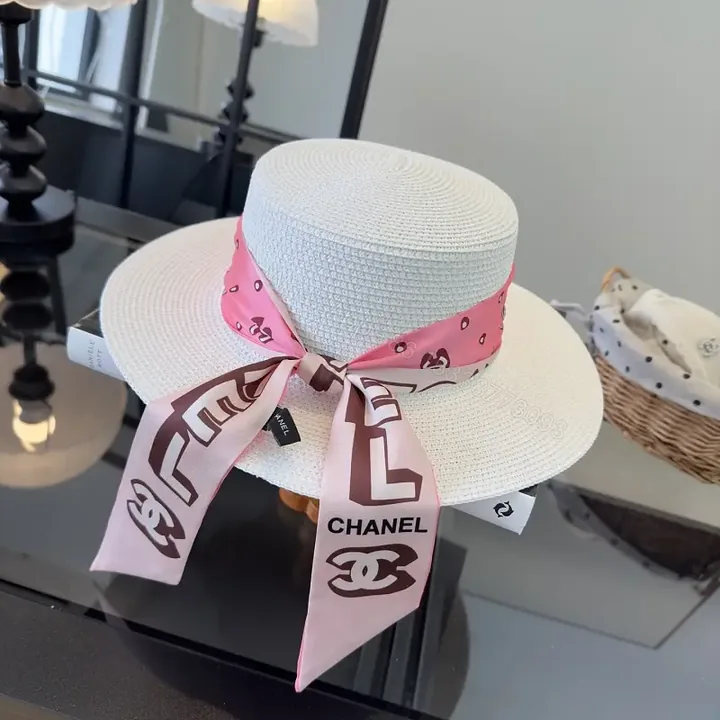 View 1 of White Silk Pink Scarf Band Straw Hat with Bow Chanel Logo