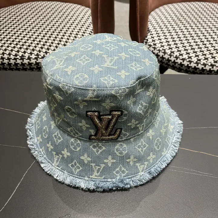 View 1 of Denim-Print Bucket Hat with LV Accent, Luxe Casual Accessory