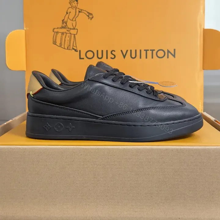 View 1 of Black Calf Leather Low-Top Sneakers Minimal Luxury Detail