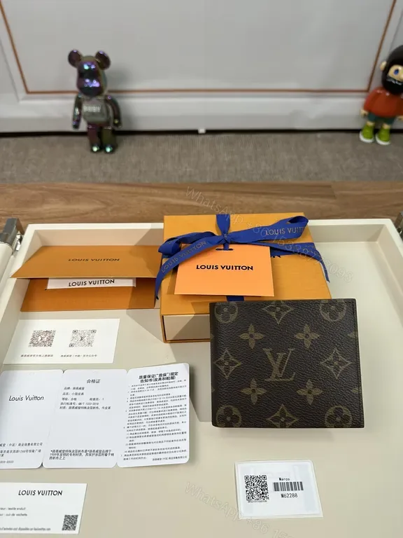 View 1 of Monogram Leather Wallet: Classic Louis Vuitton Bi-Fold, Slim Profile