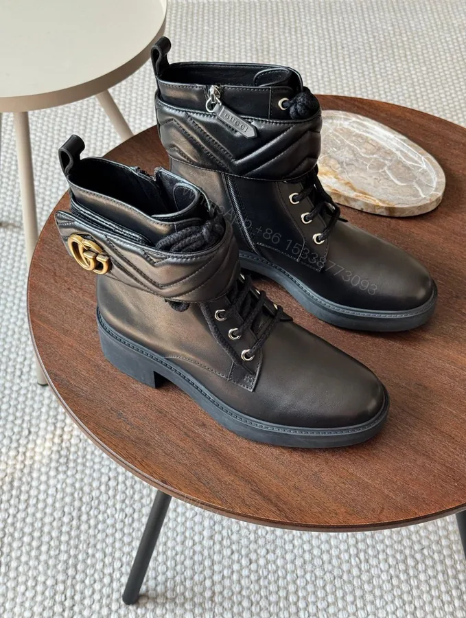View 1 of Gucci Ankle boots with logo