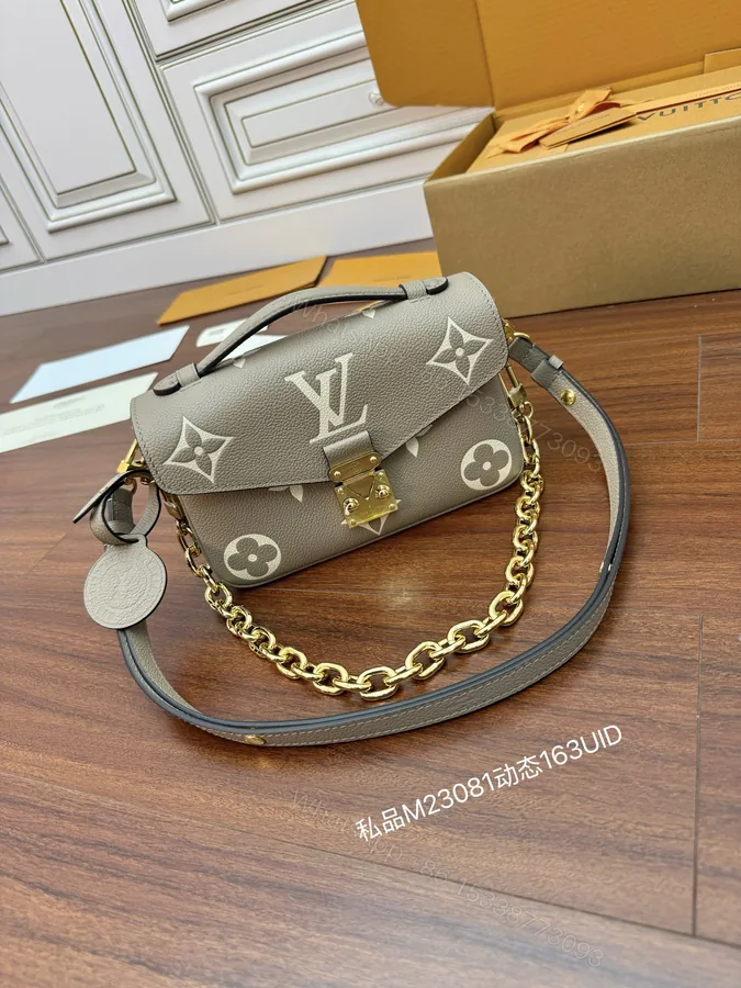 View 1 of Louis Vuitton Pochette Métis East West Tourterelle Bag