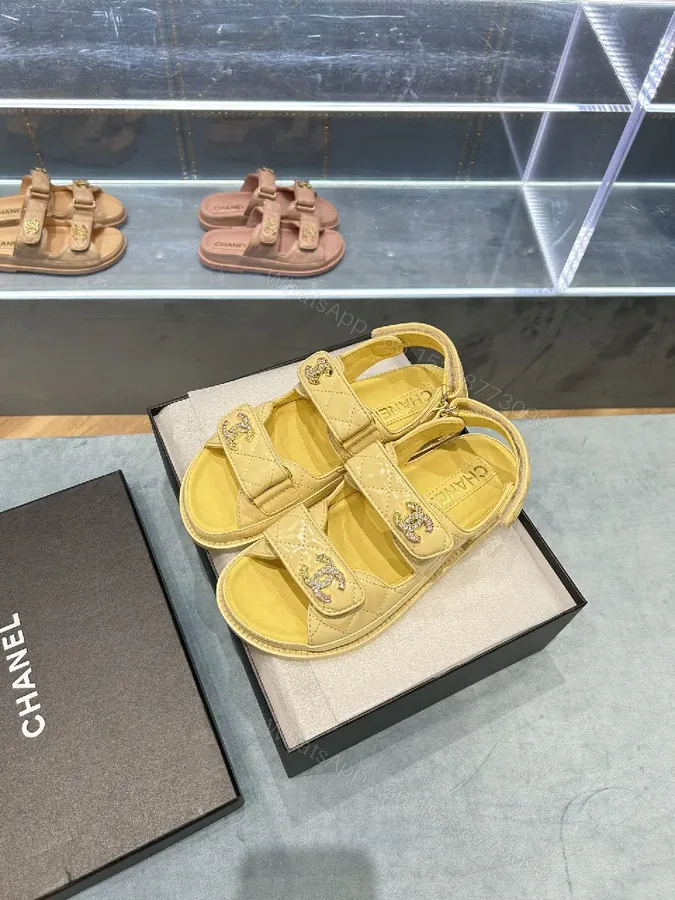 View 1 of Soft-Yellow Quilted Sandals with Logo Hardware - Luxury Comfort Sandals