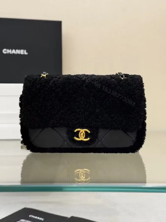 View 1 of Lux Black Shearling Clutch with Gold Logo