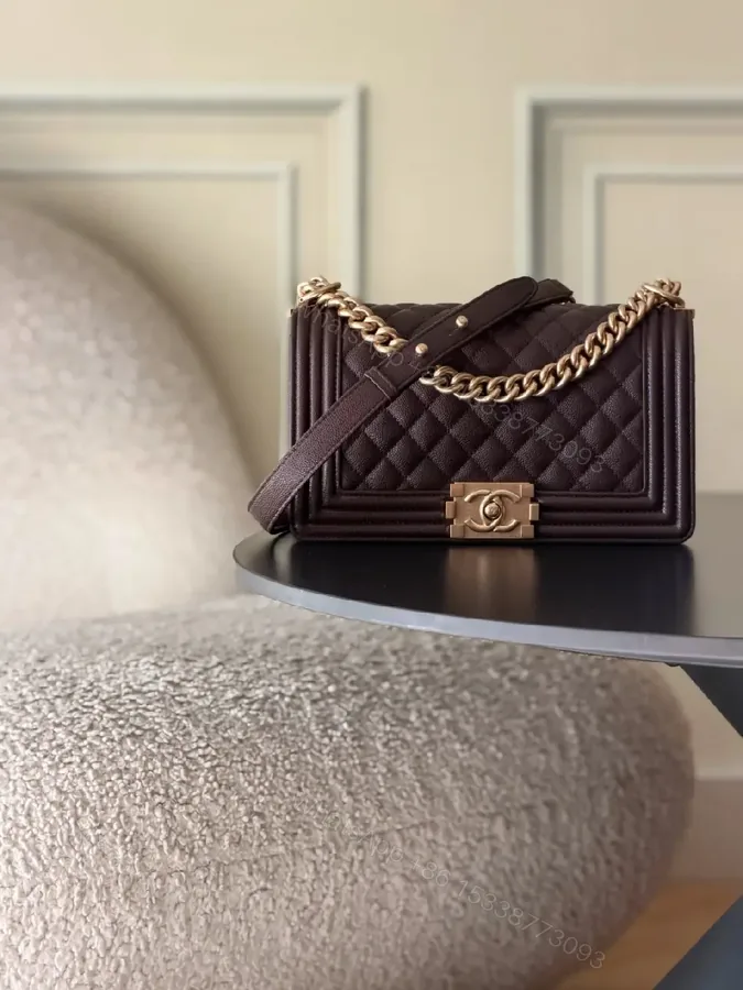 View 1 of Quilted Leather Shoulder Bag with Chain-Detail Elegance