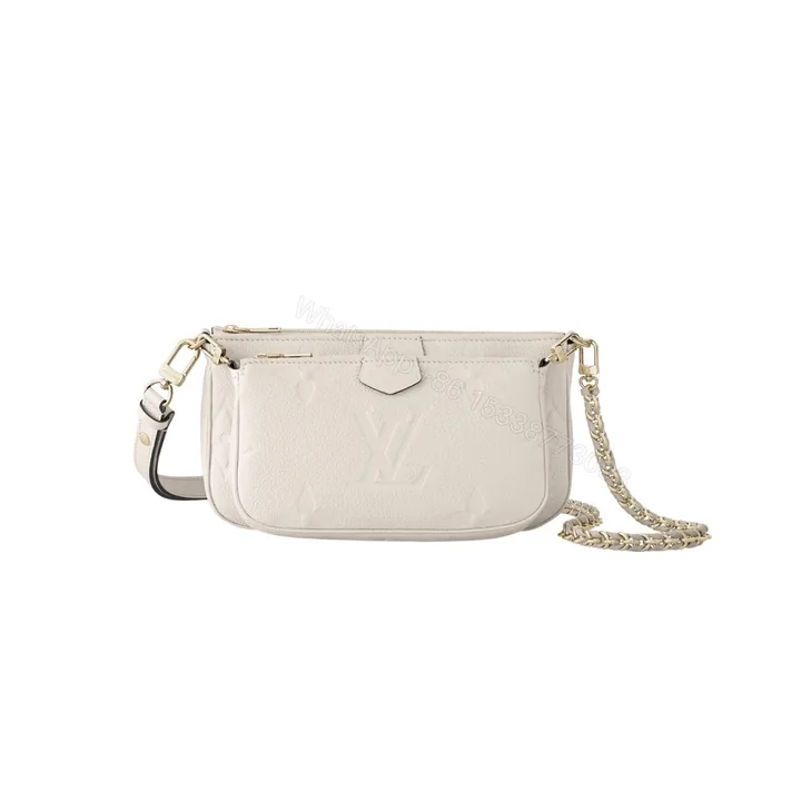 View 1 of Louis Vuitton Multi Pochette Accessoires Monogram Empreinte Cream 25Cm