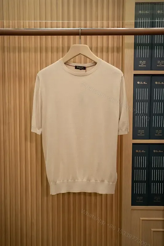 View 1 of Off-White Knit Short-Sleeve Crew Neck Sweater, Smooth Texture
