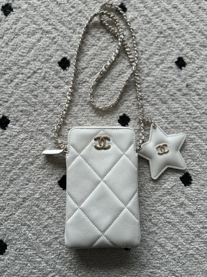 View 1 of Quilted White Leather Mini Crossbody with Silver Hardware